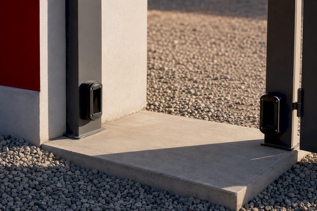 Concrete footing and automatic gate safety sensors