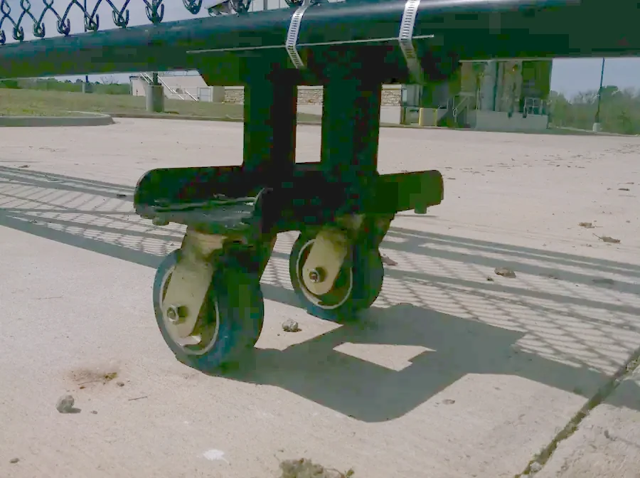 Rolling gate on a track at a commercial entrance
