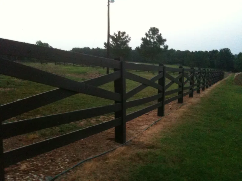 Agricultural fencing enclosing pasture land