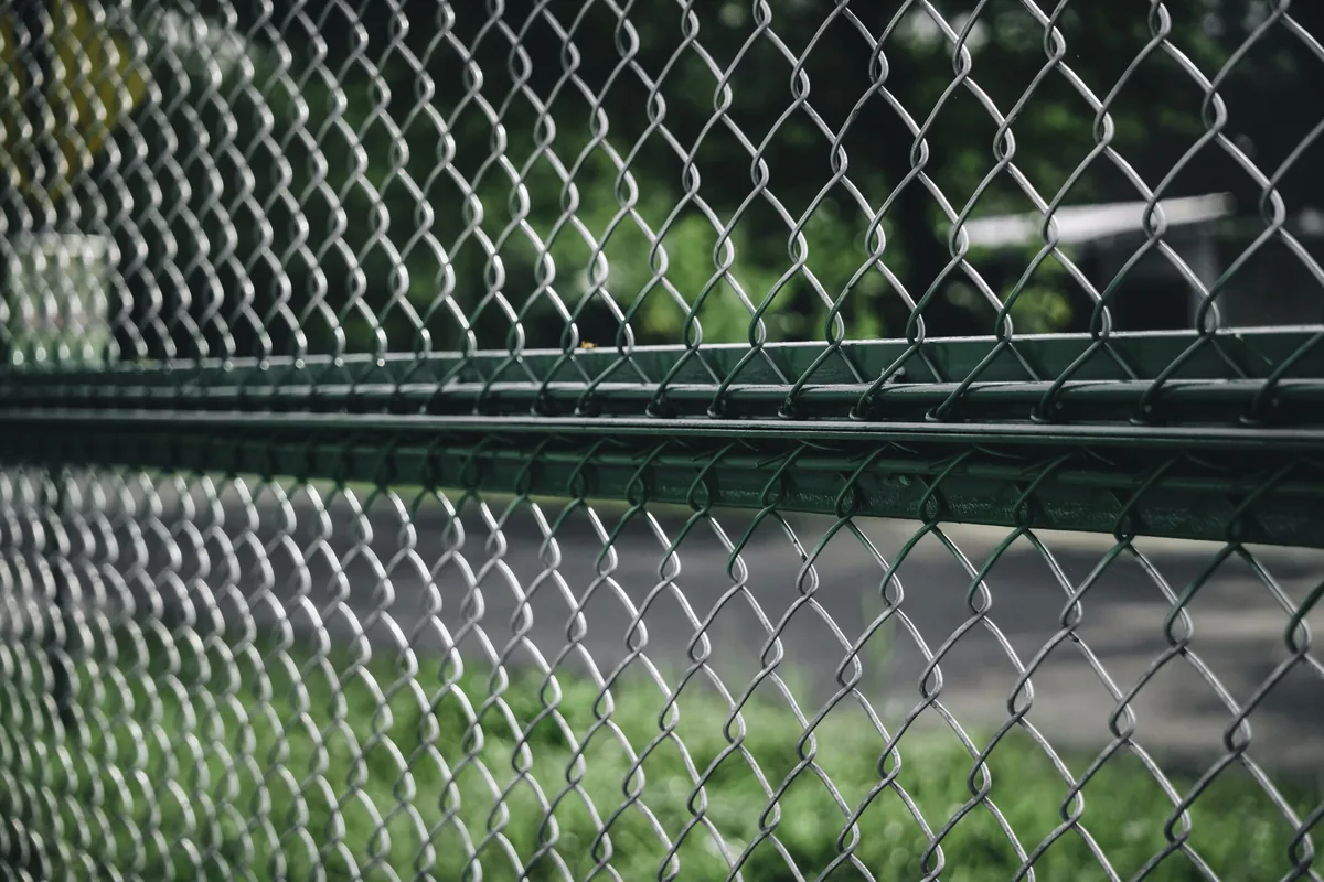 Coated chain link fence along a commercial boundary