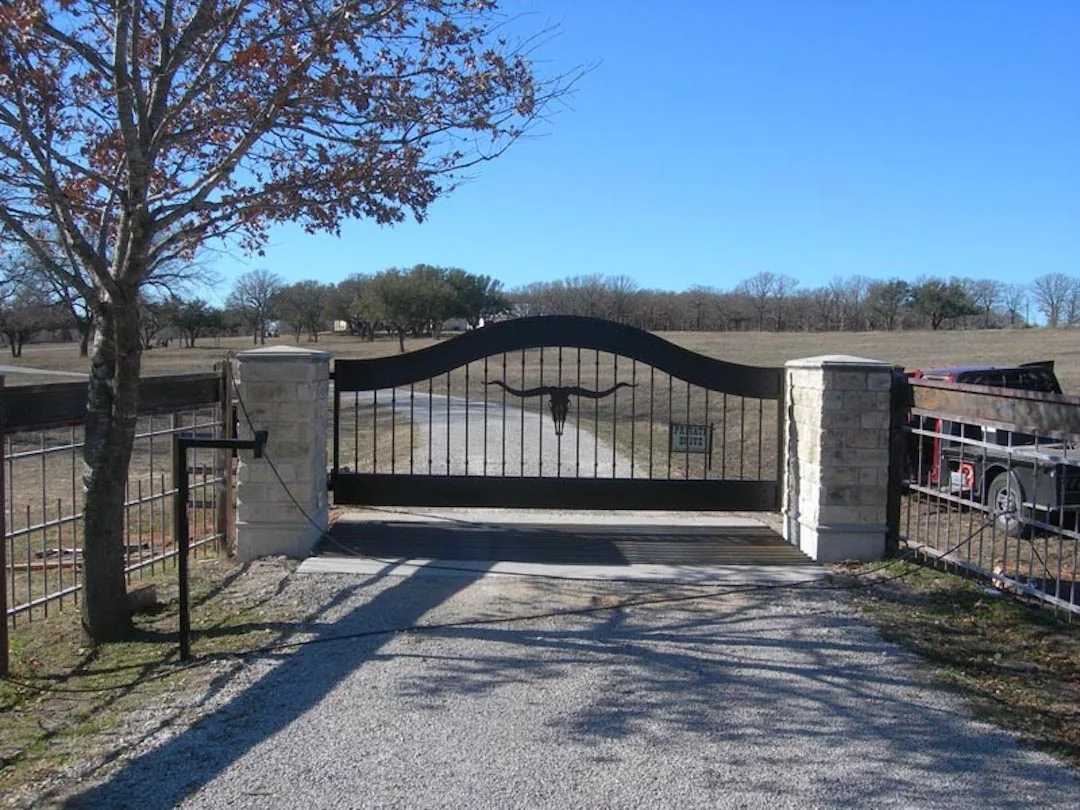 Automatic ornamental swing gate at a property entrance