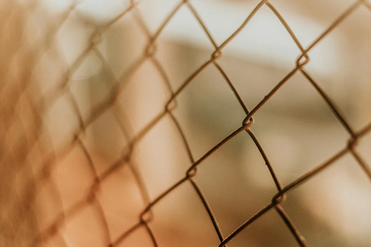 Bronze-coated chain link mesh on a commercial property