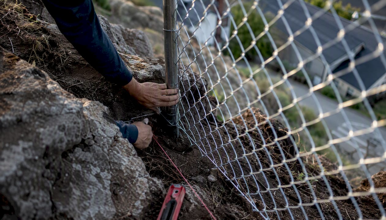 Measuring fence post placement on sloped terrain