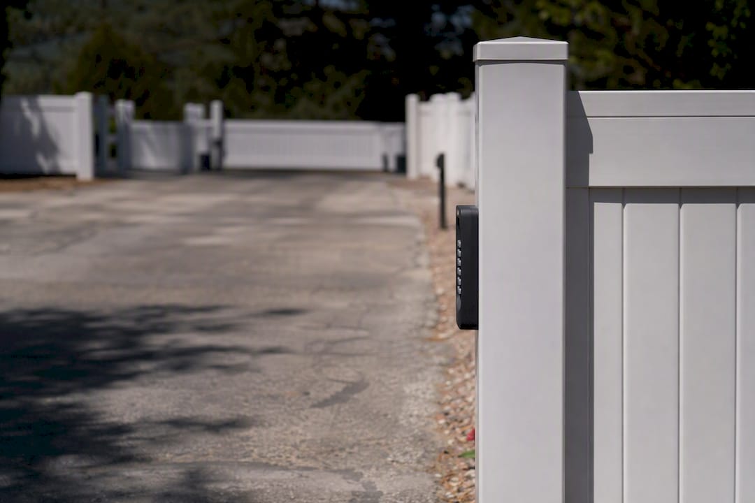 Keypad placement obstructed by fence post on driveway