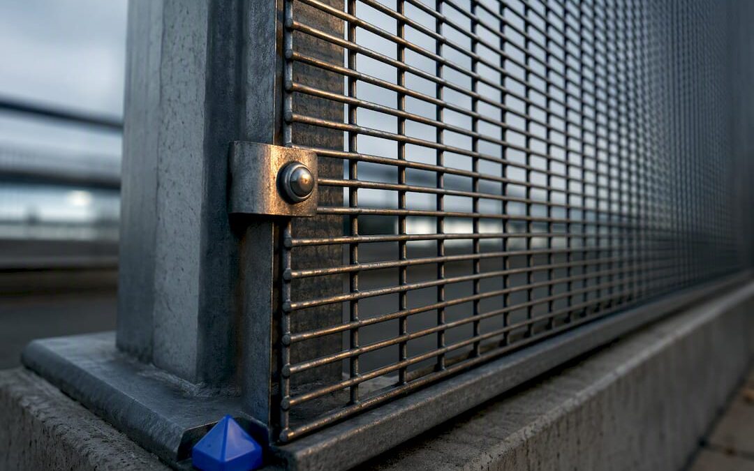 Anti-climb mesh fence post connection