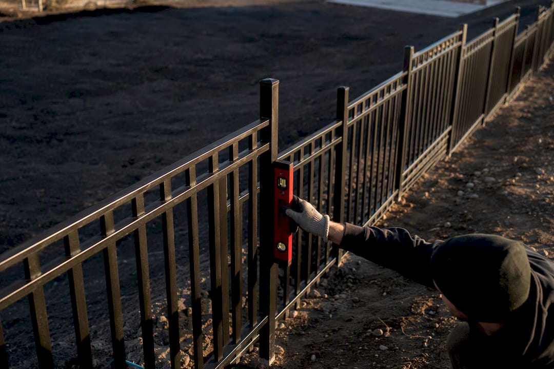 Stepped fence following playground site slope